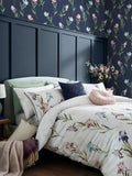 Laura Ashley floral watercolour wallpaper with iris pattern in midnight seaspray, UK version