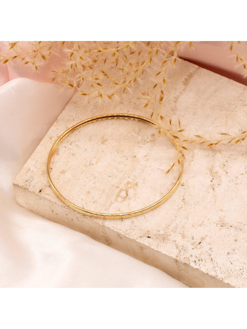 IBB 9ct gold diamond cut flat tube bangle (British brand)