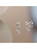 IBB cross cubic zirconia earrings in 18ct white gold - British product