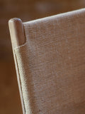 nkuku Nayan counter chair in tan buffalo leather, imported from the UK