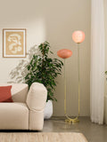 MADE floor lamp with pink glass shades and brass accents, imported from the UK