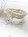 Kit Heath Marina Tide knot stud earrings in silver, UK version