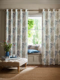 Laura Ashley lined eyelet curtains with floral design in seaspray, UK version