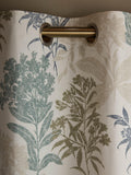 Laura Ashley lined eyelet curtains with floral design in seaspray, UK version