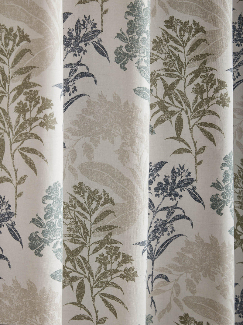 Laura Ashley lined eyelet curtains with floral design in seaspray, UK version