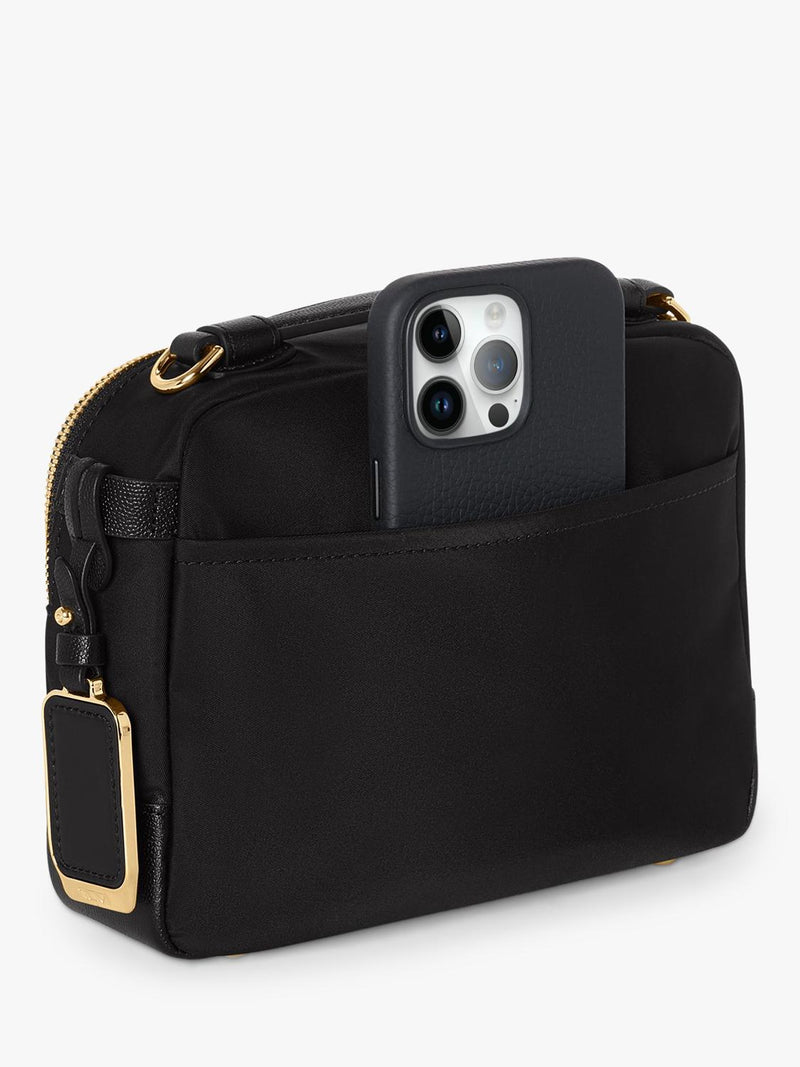 TUMI Teghan crossbody bag black gold, UK version