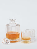 John Lewis ribbed cut glass decanter and tumblers, imported from the UK