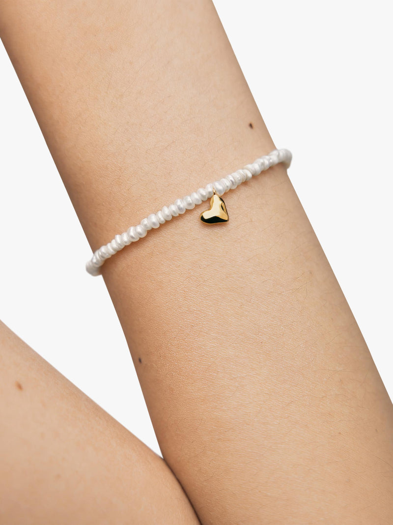 Monica Vinader Mini Heart Pearl Bracelet Gold, imported from the UK