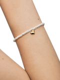 Monica Vinader Mini Heart Pearl Bracelet Gold, imported from the UK