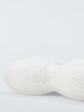 John Lewis daisy-shaped boucle cushion, UK version