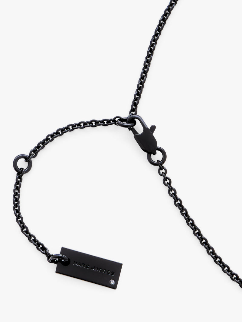 Marc Jacobs pave balloon daisy pendant black 46mm, imported from the UK