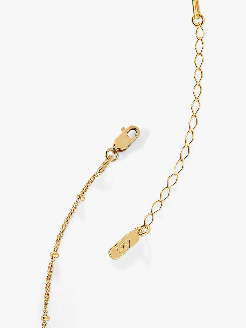 Edge of Ember gold initial pendant necklace (British brand)