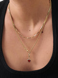 Edge of Ember red garnet heart necklace, imported from the UK