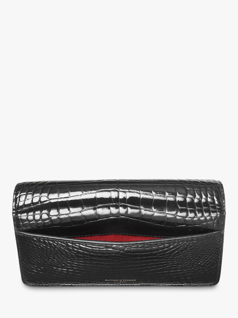 Aspinal of London patent croc clutch bag in black, imported from the UK