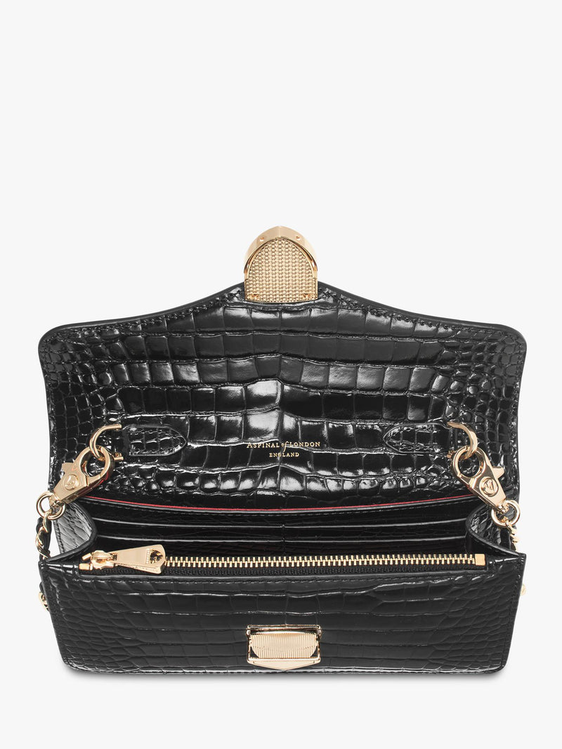 Aspinal of London patent croc clutch bag in black, imported from the UK