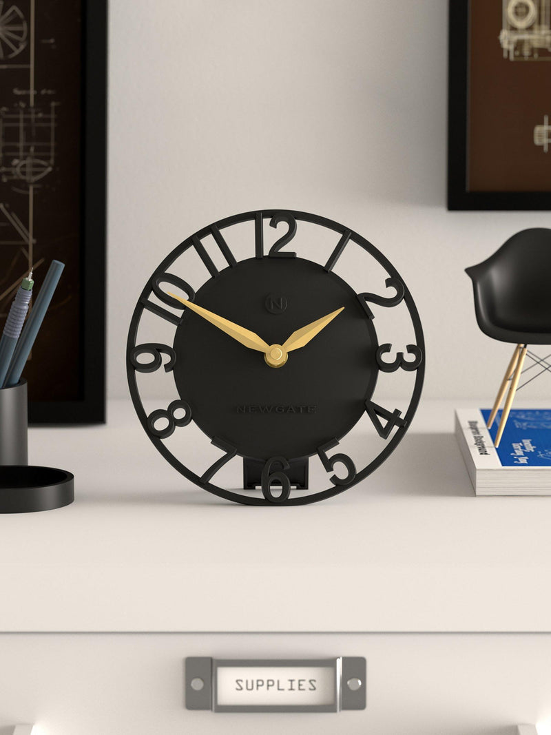 Newgate Timewarp mantel clock in black with gold-tone hands (British brand)