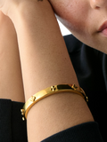kate spade new york hinged flower bangle gold plated, imported from the UK