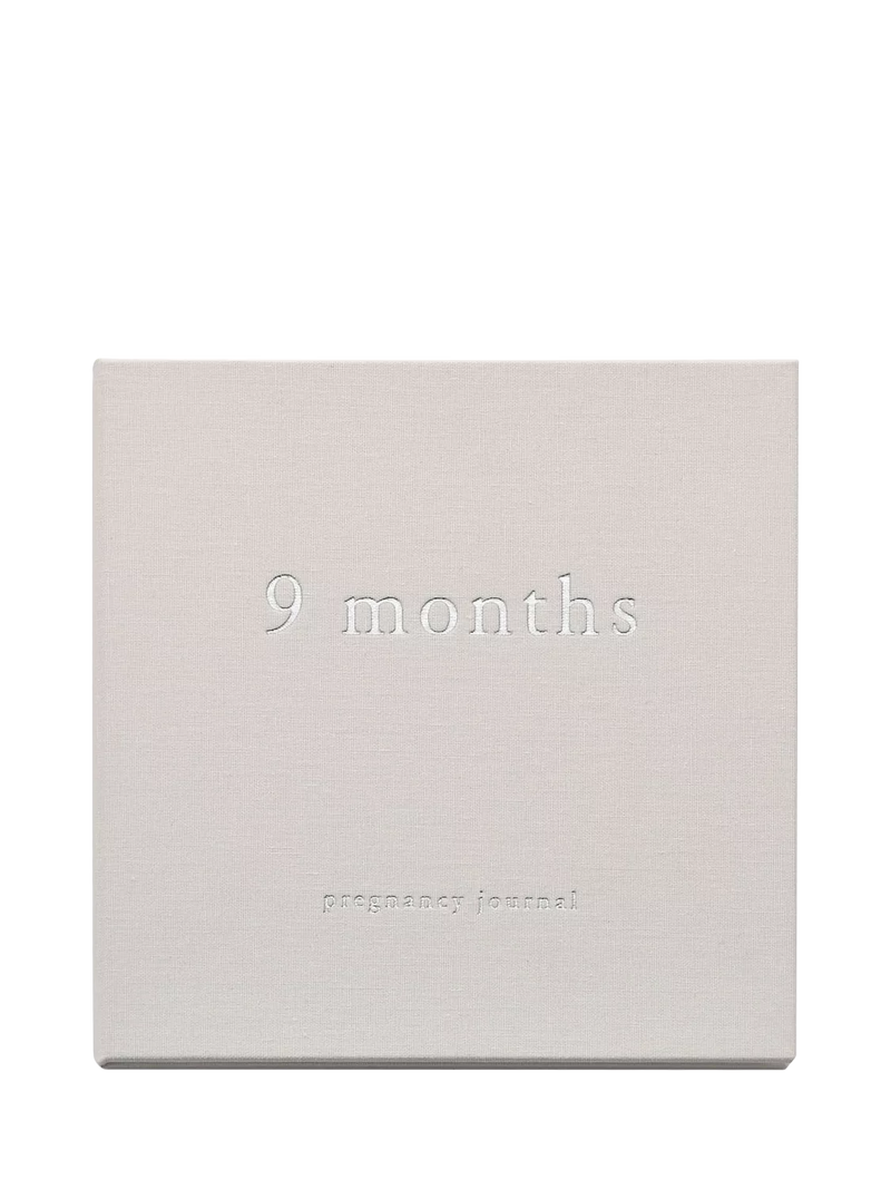 Bambino white linen cover pregnancy journal with silver debossed lettering, UK version