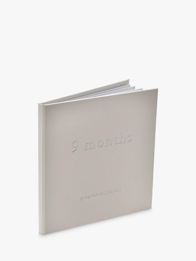 Bambino white linen cover pregnancy journal with silver debossed lettering, UK version
