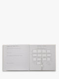 Bambino white linen cover pregnancy journal with silver debossed lettering, UK version
