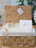 Bumbles & Boo baby boy gift hamper in water hyacinth basket (British brand)