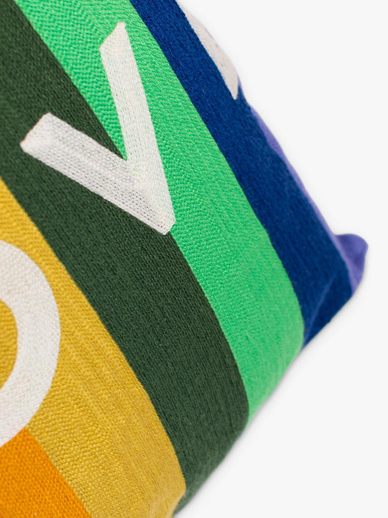 The Pillow Drop love cushion rainbow design, imported from the UK