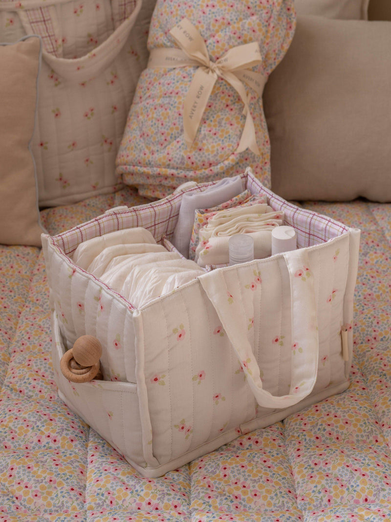 Avery Row baby changing caddy in Anemone floral print - British product