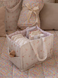 Avery Row baby changing caddy in Anemone floral print - British product