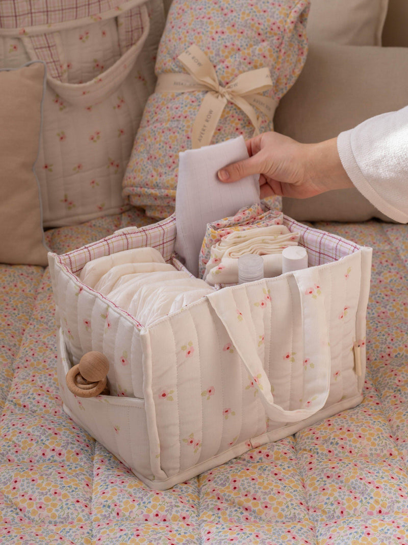Avery Row baby changing caddy in Anemone floral print - British product
