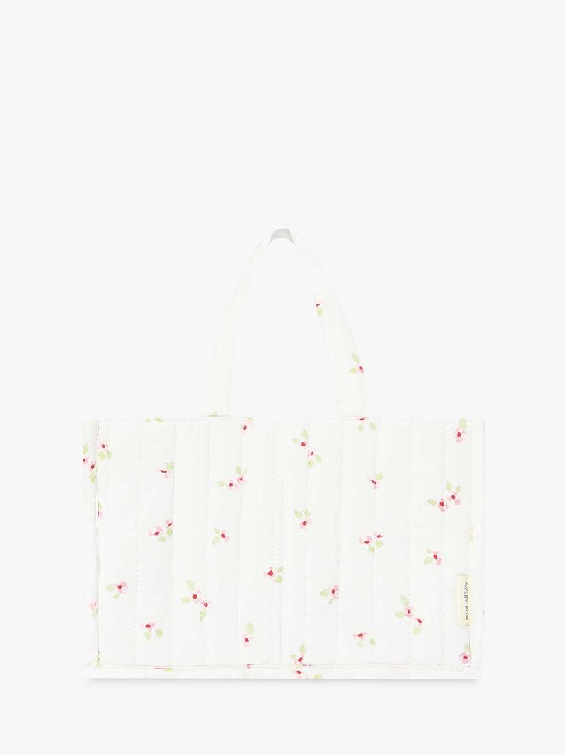 Avery Row baby changing caddy in Anemone floral print - British product