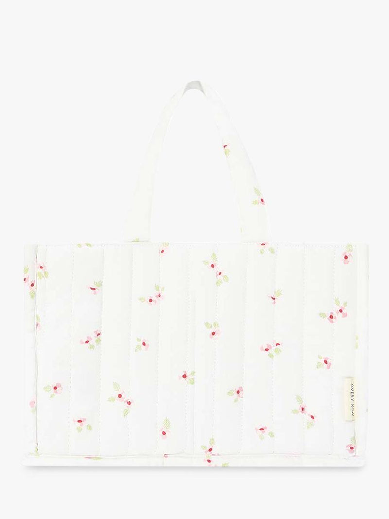 Avery Row baby changing caddy in Anemone floral print - British product