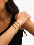 Jon Richard gold crystal bangle with waterproof technology, UK version