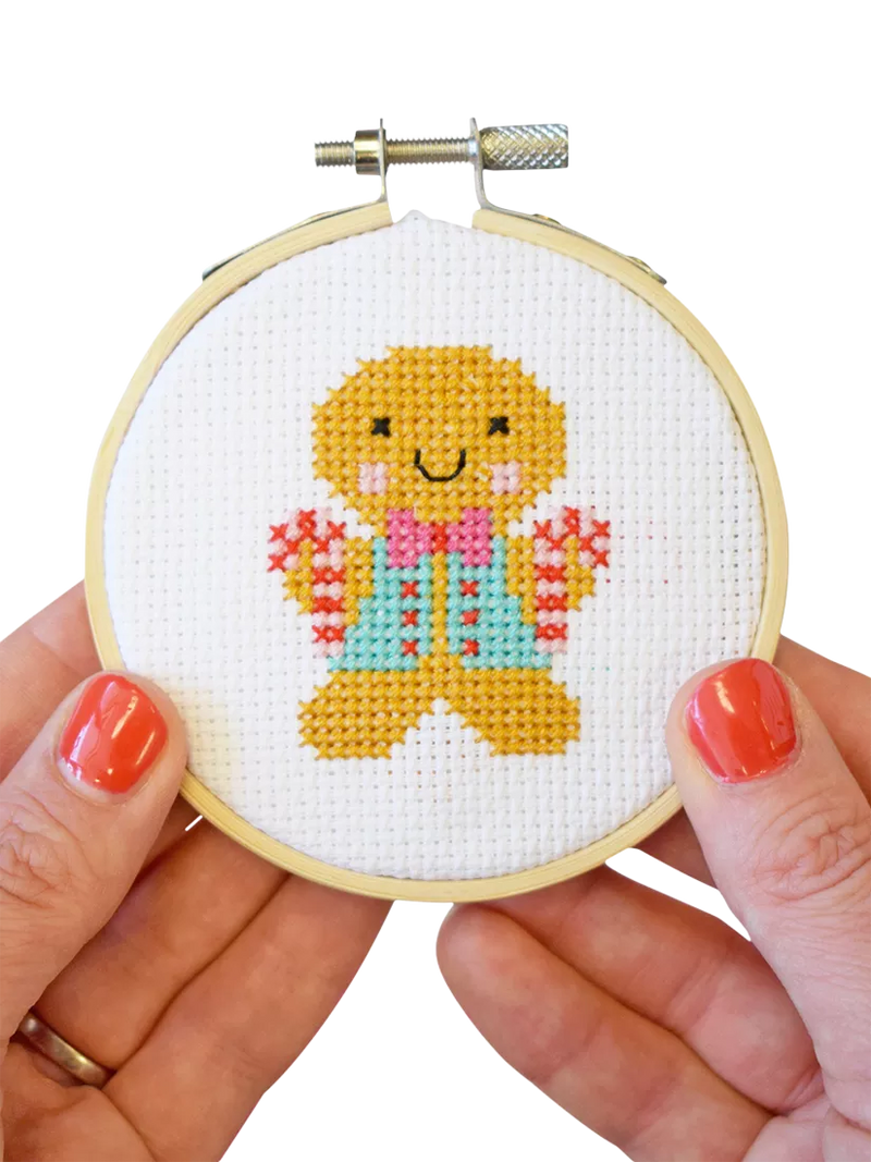 The Make Arcade gingerbread man mini cross stitch kit, UK version