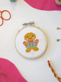 The Make Arcade gingerbread man mini cross stitch kit, UK version