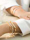Monica Vinader gold bangle with 32 lab grown diamonds (British brand)