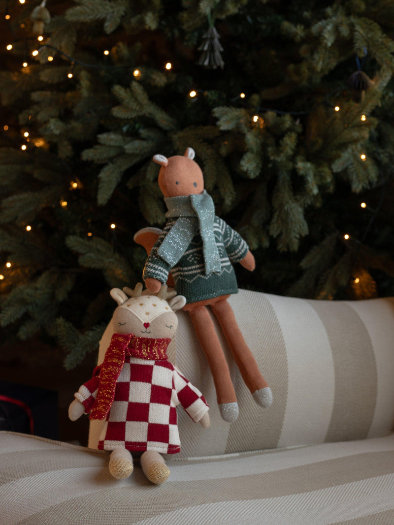 Avery Row knitted reindeer doll with checkerboard jumper and scarf (British brand)