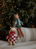 Avery Row knitted reindeer doll with checkerboard jumper and scarf (British brand)