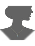 Mogul yellow gold oval emerald diamond pendant, imported from the UK