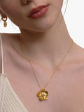 Ottoman Hands gold flower pendant necklace, imported from the UK