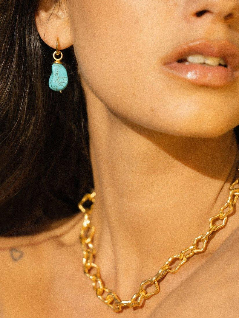 Ottoman Hands gold plated Ava turquoise huggie earrings, imported from the UK