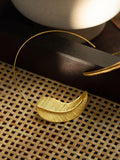 Ottoman Hands feather hoop earrings in gold - British product