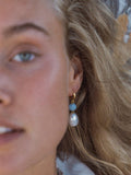 Ottoman Hands huggie pearl earrings gold with blue chalcedony (British brand)