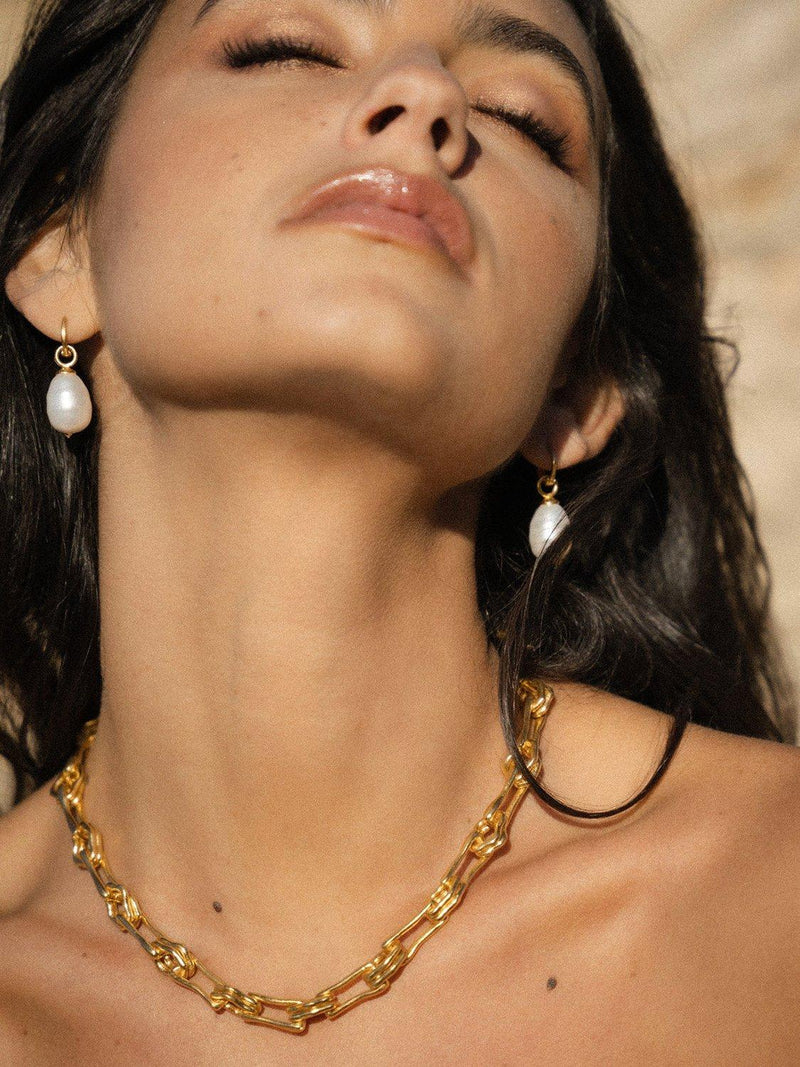 Ottoman Hands Ava Pearl Drop Earrings in gold, imported from the UK