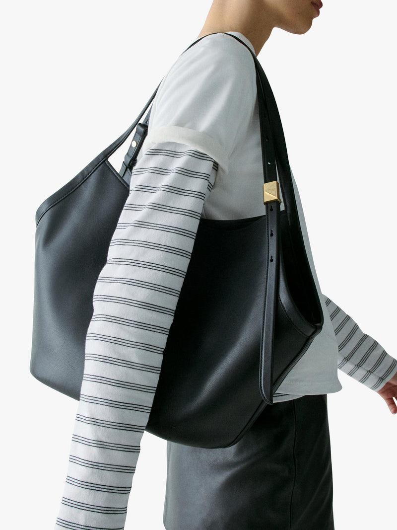 Kate Spade black Deco Tulip leather tote bag, imported from the UK