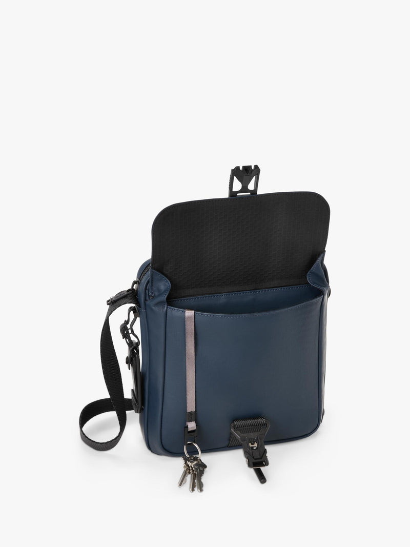 TUMI Junior crossbody bag navy coated canvas, UK version