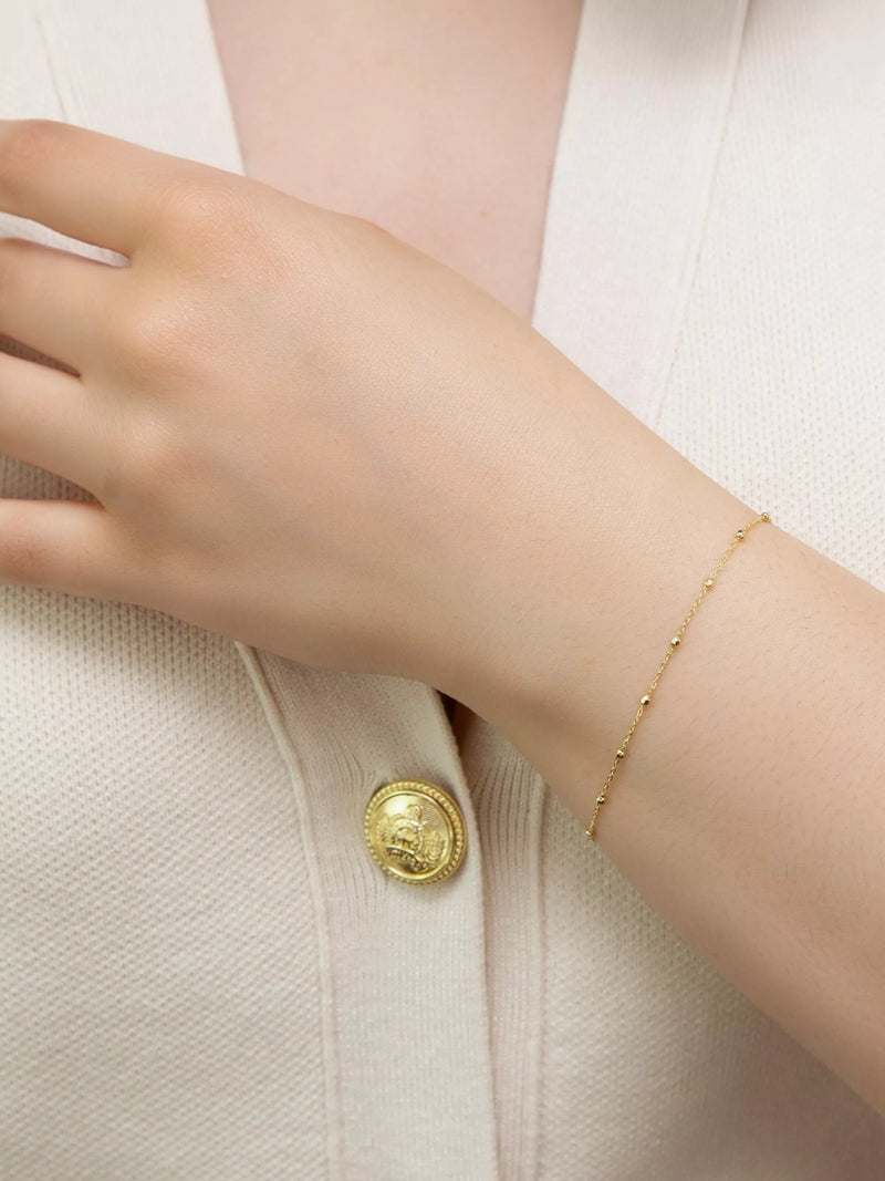 IBB 9ct yellow gold diamond cut ball trace bracelet, UK version