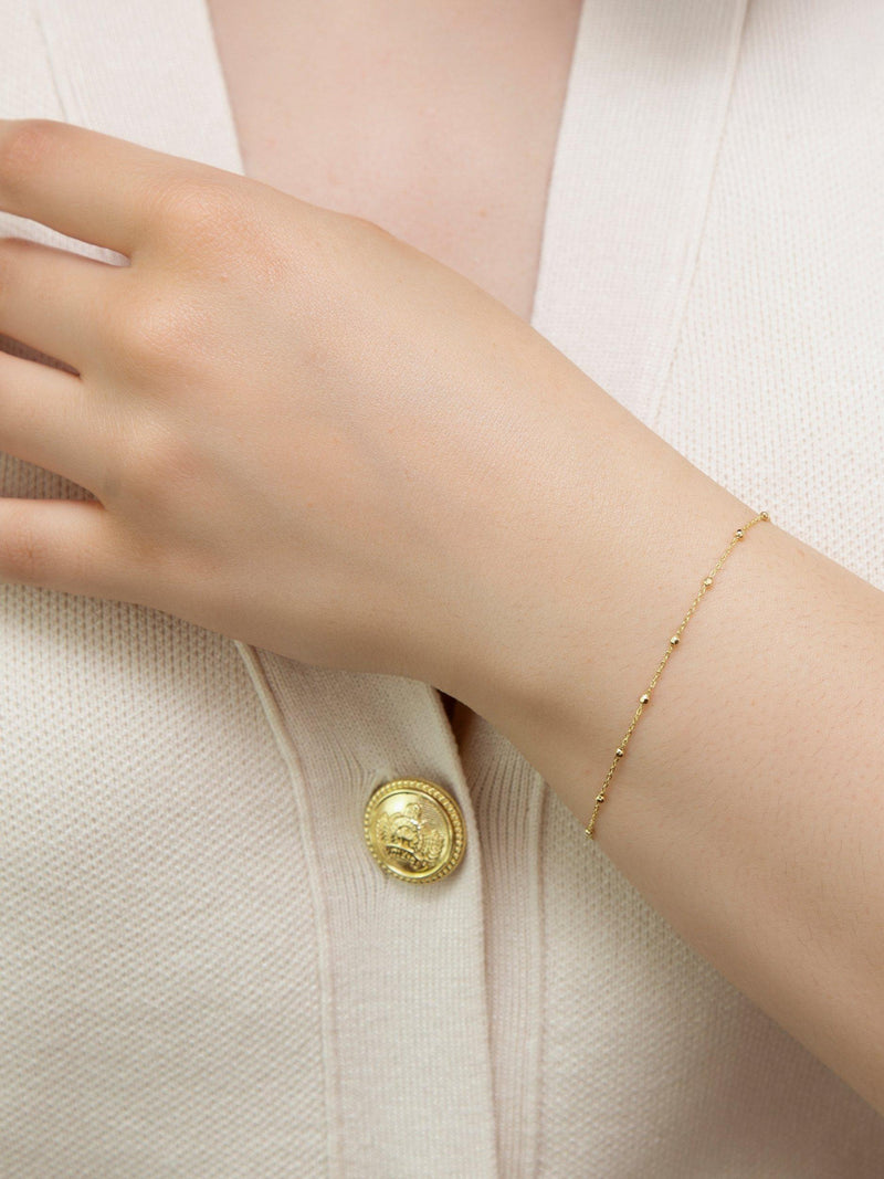 IBB 9ct yellow gold diamond cut ball trace bracelet, UK version