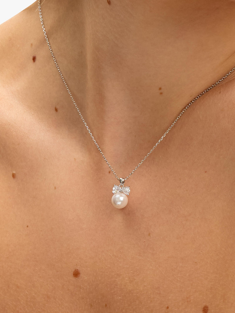 Jon Richard crystal bow and pearl drop earring set in silver, UK version