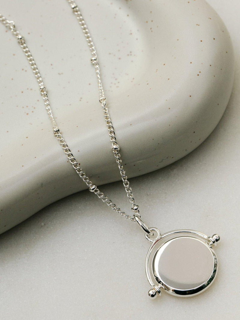 Orelia silver disc spinner necklace (British brand)