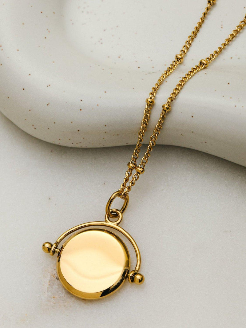 Orelia Faceted Disc Spinner Necklace pale gold 45.5cm (British brand)